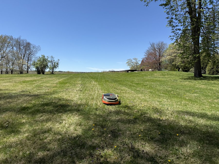 Segway Navimow running on a large Connecticut lawn